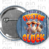 What a Fuster Cluck pin back button with blue wood background