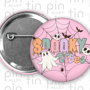 Spooky Vibes fun retro Halloween 1.5 inch pin back button with pink background.